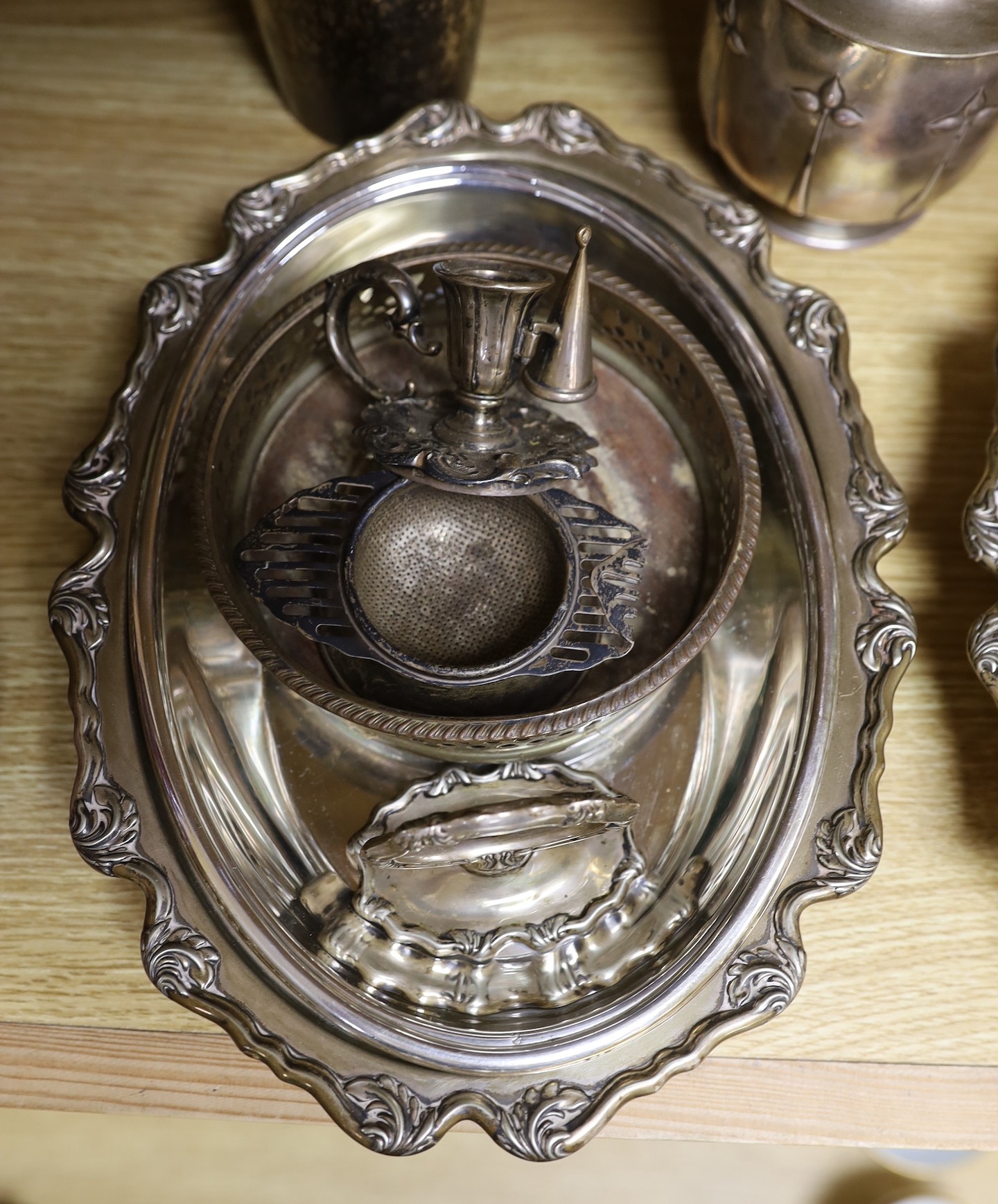 A group of mixed plated wares including tureen, cocktail shaker, claret jug, candlesticks etc.